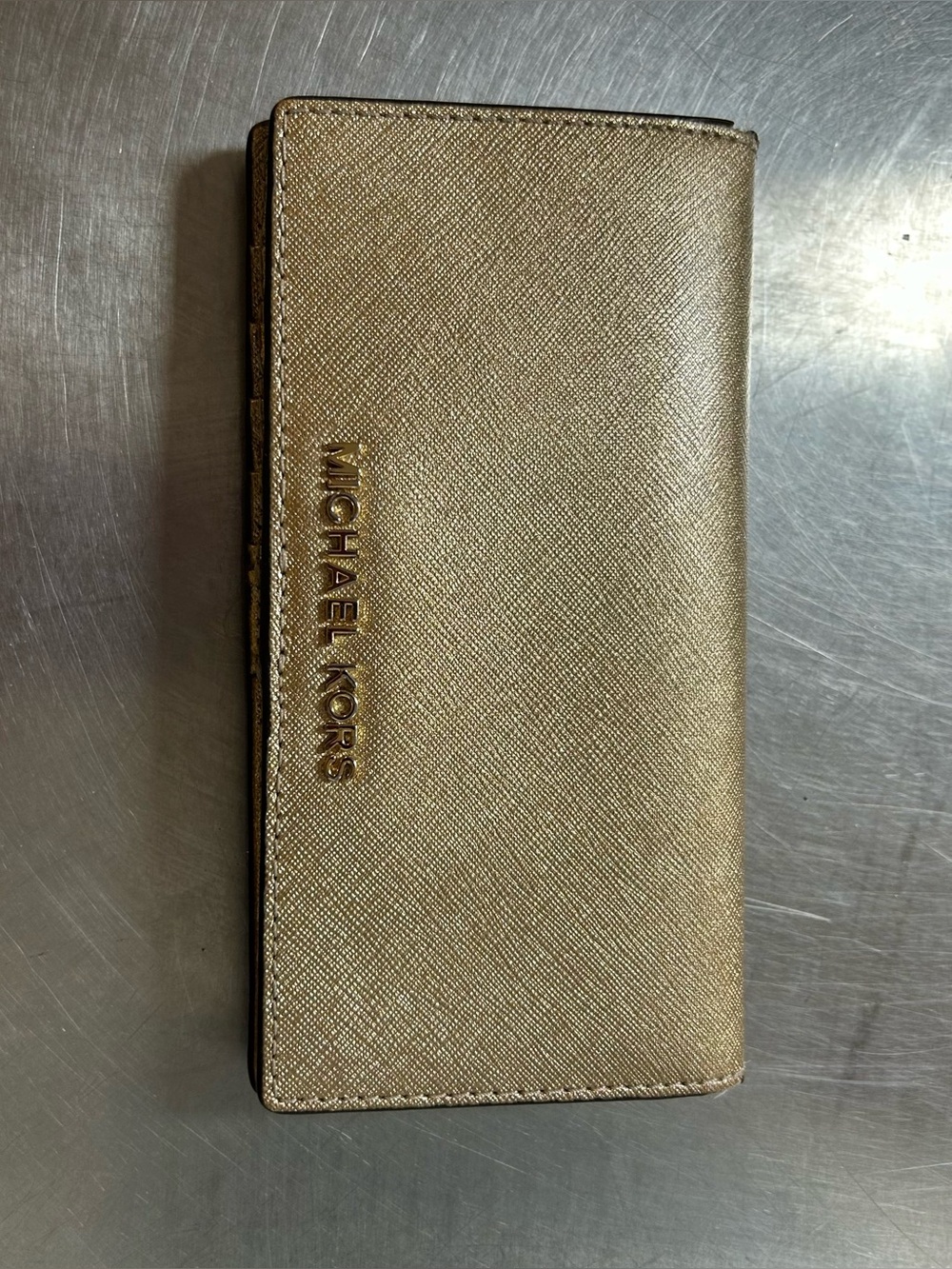 Michael Kors Jet Set Travel Flat Slim Bifold wallet pale gold saffiano leather